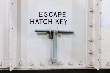 Escape Hatch 'T' Key on a ship for emergency use.