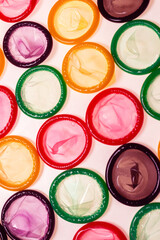 Colorful condoms background.