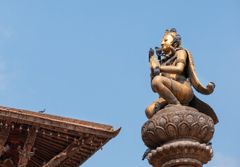 Real art masterpiece in old temple decorations statue of Garuda god of birds on Patan Durbar Square...