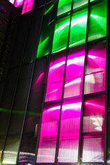 Multicoloured lights as seen from outside a building