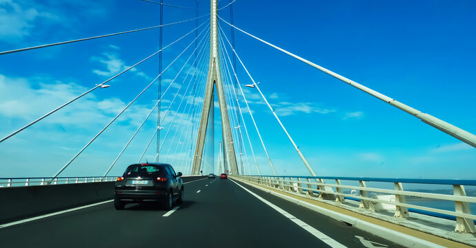 Pont de Normandie, France - September 9. 2015: View on modern cable-stayed road bridge over river Seine against blue sky