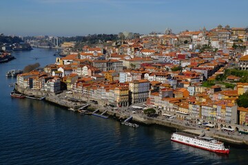 Fototapeta na wymiar Amazing view of Douro River and panorama of Porto, Portugal
