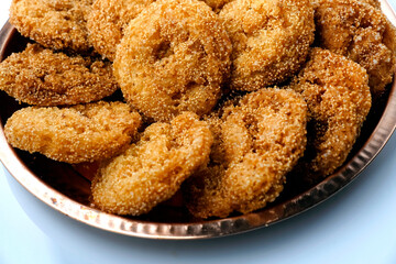 Anarsa which is an authentic sweet snack especially made in the festive season like Diwali in Maharashtra, it is also made in Marathi cultured adhik maas, selective focus.