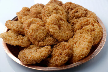 Anarsa which is an authentic sweet snack especially made in the festive season like Diwali in Maharashtra, it is also made in Marathi cultured adhik maas, selective focus.