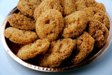Anarsa which is an authentic sweet snack especially made in the festive season like Diwali in Maharashtra, it is also made in Marathi cultured adhik maas, selective focus.