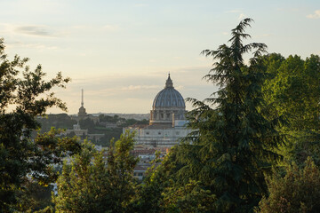 City view of Rome with St. Peter's Basilica in the distance.