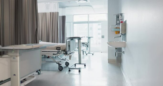 Hospital, modern and interior of bedroom or empty room for healthcare, consulting or healing. Background, medical and clinic space for emergency, rehabilitation or recovery with furniture or light