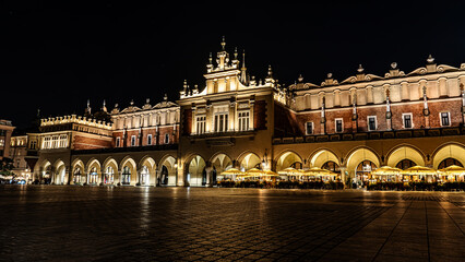 The main square of the old town in Krakow in the night lights.