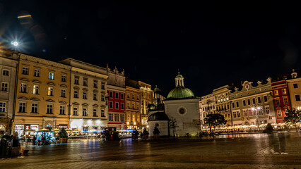 The main square of the old town in Krakow in the night lights.