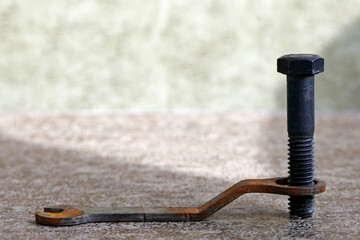 old rusty screw and wrench. industrial objects