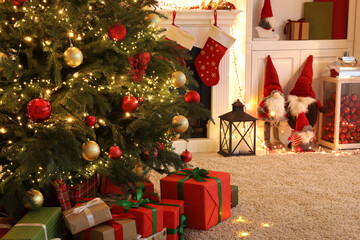 Living room interior with fireplace and festive decor. Christmas celebration