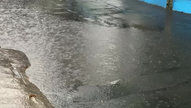 water flowing into the road