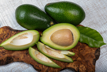 Green ripe avocado fruits from organic avocado plantation - healthy food
