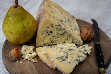 Cheese collection, English semi-soft, crumbly old stilton blue cheese close up