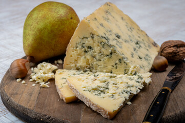 Cheese collection, English semi-soft, crumbly old stilton blue cheese close up