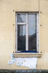 Fototapeta na wymiar Old wooden double sash window. Painted white.