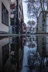 Photo from the historic city center of Frankfurt am Main.  Beautiful old town with old houses and alleys.  Reflections in the morning without people
