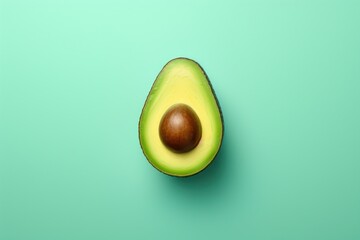 avocado in slicing on a blue background, highlighting vegan and avocado oil uses