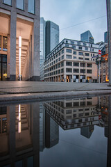 Photos from and in the skyline of Frankfurt.  Beautiful modern high-rise buildings in the glow of...