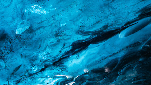 Iceland. Ice as a background. Vatnajokull National Park. Inside view of the ice cave. Winter landscapes in Iceland. Natural background. North country.