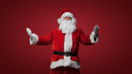 Santa Claus in a welcoming pose, open arms for Christmas cheer