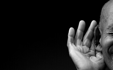 suffering from deafness and hearing loss on grey black background with people stock image stock...