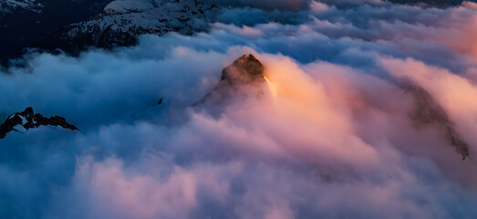 Canadian Mountain Landscape. Aerial Panoramic View. Dramatic Sunset.