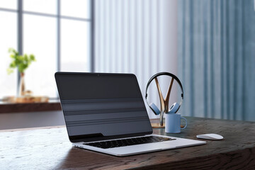 Close u of creative designer table with laptop, coffee cup, other items and window with city view in the background. 3D Rendering.