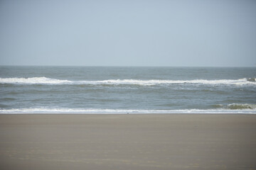 Waves of the North Sea on the beach