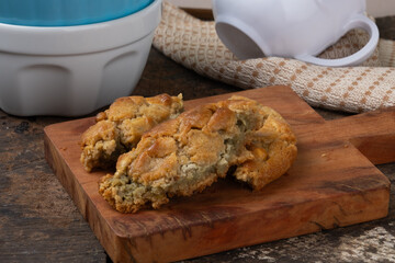 Pieces of cookies on cutting board. Selective focus.