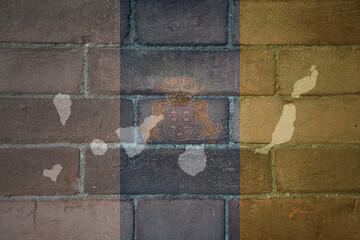 map and flag of canary islands on a old brick wall