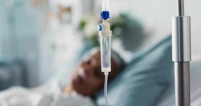 IV drip, healthcare and medicine with patient in hospital, treatment and surgery, healing or rehabilitation. Person at clinic, health with medication or liquid for infusion, service and recovery