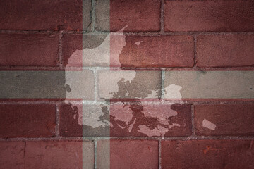 map and flag of denmark on a old brick wall