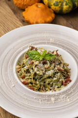 Italian cuisine. Pasta with meat and parmesan cheese. Close up