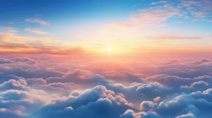 Fotobehang  the sun shines brightly above the clouds in this view of a blue sky with pink and yellow hues. © Oleg