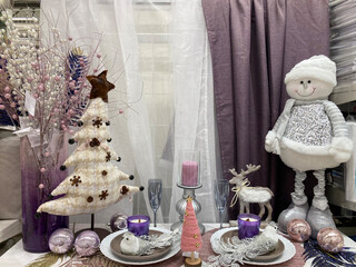 Christmas table decoration with tree and snowman