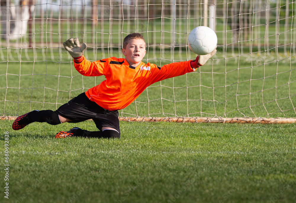 Wall mural Young Boy Goalkeeper