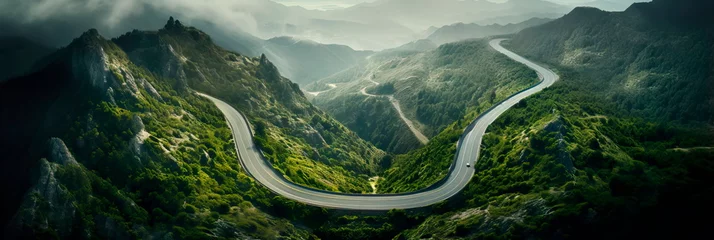 Tuinposter winding mountain road as it snakes through rugged terrain, offering a bird's-eye view of the challenging twists and turns. Generative AI © Лилия Захарчук