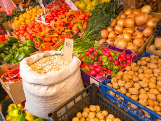 A variety of fresh fruits, seeds, nuts and vegetables on display at the market. Food