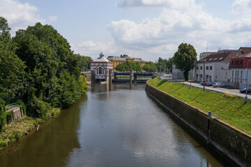 Hradec Kralove, Czech Republic - July 22, 2023 - the Moravian weir with hydroelectric power plant in the middle of summer   