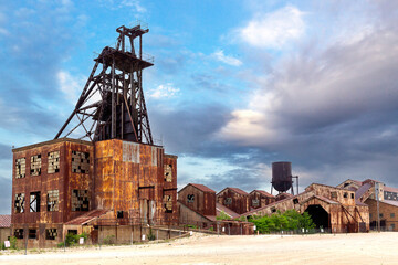 Landscape with abandoned mining facilities and buildings at the Missouri Mines State Historic Site...