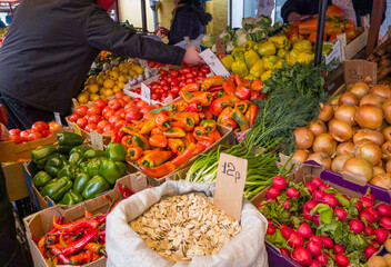 A variety of fresh fruits, seeds, nuts and vegetables on display at the market. Food