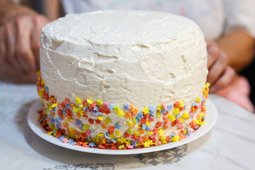 Colorful Crescendo: Decorating a Homemade Cake with Edible Stars