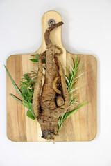 old vegetable variety oat root, cooked on a wooden board