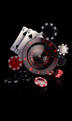 Poker cards a roulette wheel. Casino chips, dices and playing cards on a black background