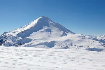 Fototapeta na wymiar Snowy Landscapes in the Tatra Mountains, Poland. Pristine White Peaks Meet Clear Blue Sky