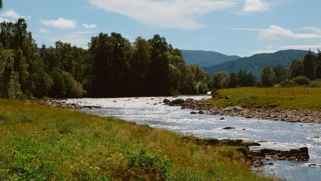 Wide view of river Dee in the Royal Deeside, Aberdeenshire, Scotland, England, UK, a region made famous by Queen Victoria