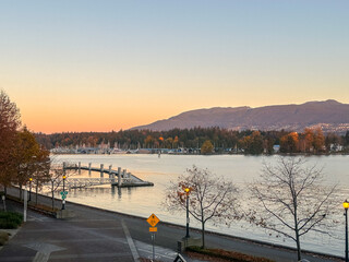 Vancouver, BC - October 29, 2023: Coal Harbor seen from along the seawall pathway during the fall...