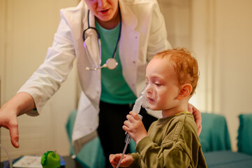 A boy is using neutralizer and inhalation at home with pediatrician.