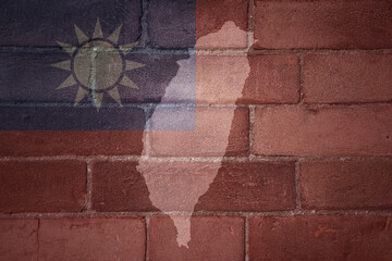 map and flag of taiwan on a old brick wall